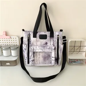 Detailed view of large purple tote bag with traditional Chinese calligraphy and PVC window