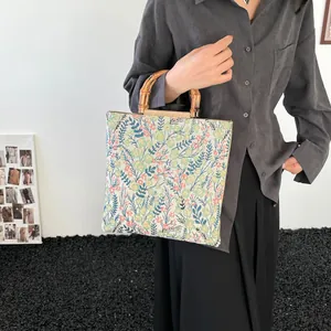 Floral canvas tote bag with bamboo handles and vintage flower pattern for women