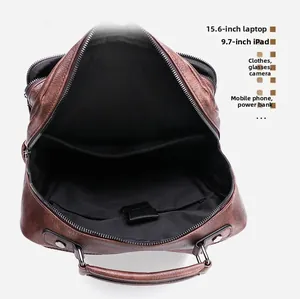 Interior layout of leather laptop backpack showing 15.6 inch laptop compartment and pockets