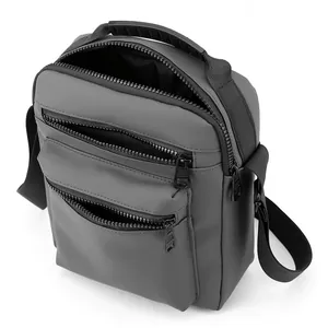 Deep grey Oxford fabric shoulder bag with three zipper compartments and top handle