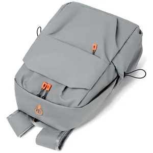 Minimalist grey backpack with orange accents and waterproof texture on white background