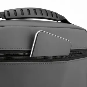 Detail of dark gray oxford fabric cross-body bag featuring zipper and anti-slip handle