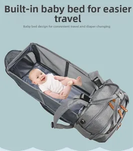 Detail of baby diaper bag showing expandable travel crib with breathable mesh sides