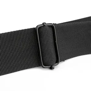 Detail shot of durable black nylon webbing strap with matte metal adjustable buckle