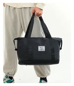 Black waterproof travel bag with double layer and separate bottom shoe compartment