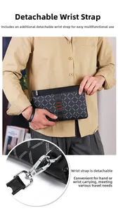 Detail of detachable wrist strap and red-green webbing on men's business clutch bag