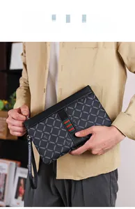 Detail of men's clutch bag featuring grey rhombus print and iconic red-green stripe decor