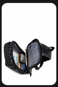 Internal view showing organized compartments and large storage capacity of camo chest bag