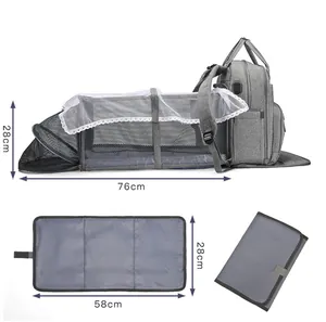 Macro view of portable baby bed expansion and waterproof diaper mat with measurements