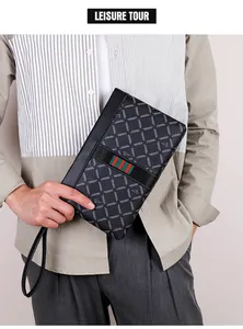 Detail of men's business clutch bag with plaid pattern and red-green striped webbing