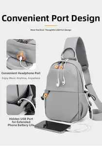 Gray crossbody bag featuring a convenient earphone hole and a hidden USB charging port