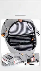 Detail view of the multi-compartment interior layout with internal pockets and zippers