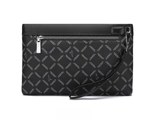 Detail view of black embossed leather men clutch bag with monogram logo and metal zipper