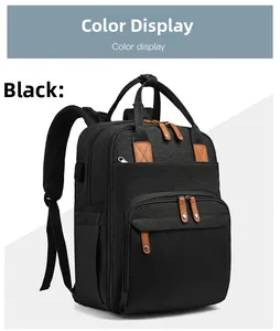 Detail of black backpack with USB port, leather pullers, and front zipper storage