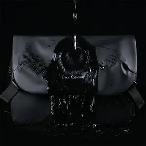 Waterproof black messenger bag with minimalist Czar Kabaine logo on a splash background