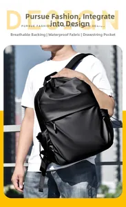 Outdoor shot of a man wearing a black waterproof backpack with breathable back system