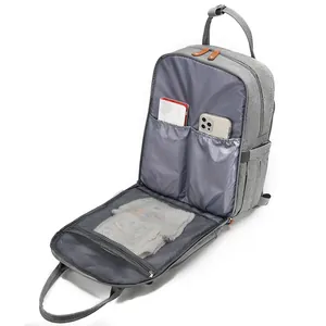 Large gray diaper backpack with internal storage compartments and mesh pocket