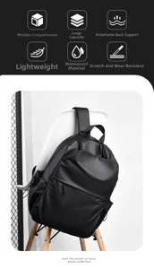 Detail view of the black waterproof laptop backpack with multi-layer storage compartments