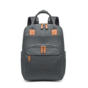 Large capacity dark grey diaper backpack with insulated pockets and foldable baby bed feature