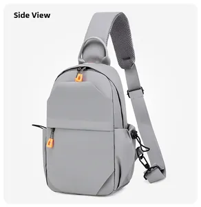 Side view of light grey techwear chest bag featuring orange zippers and mesh strap