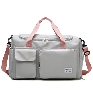 Bolsa de viaje gris claro de gran capacidad con correas rosas y tela de nylon impermeable