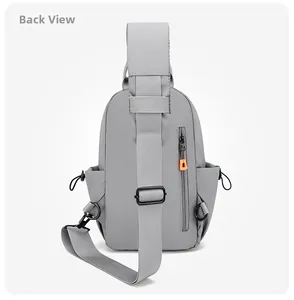 Detail view of the grey chest bag back featuring adjustable strap and secure zipper pocket