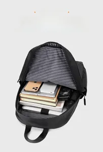 Internal view of the laptop backpack showing large capacity and striped lining storage