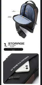 Internal storage view of black crossbody bag showing main compartment and front zipper pocket