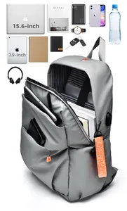 Detail view of the spacious laptop backpack compartment with USB port and accessories