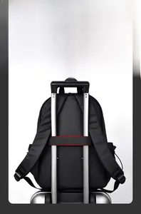 Detail of waterproof nylon laptop backpack with red stitching on trolley sleeve strap