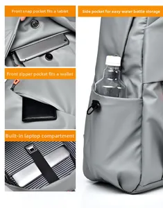 Detail view of laptop backpack showing padded compartment, front pockets and side pocket