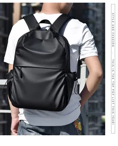 Ergonomic black laptop backpack with hidden zipper and side drawstring pocket detail