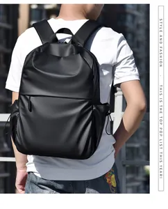Close-up of black waterproof nylon backpack featuring a large capacity main pocket