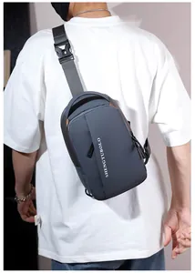 Model wearing a gray-blue waterproof oxford chest bag with nylon strap and quick-release buckle