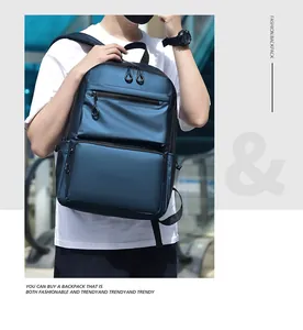 Detail of waterproof navy nylon backpack with round ring zippers and front pockets