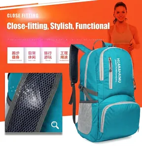 Blue lightweight folding backpack with breathable honeycomb straps and mesh side pockets