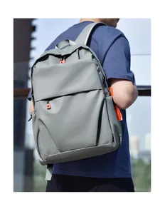 Waterproof dark grey business backpack for men featuring vibrant orange zipper accents