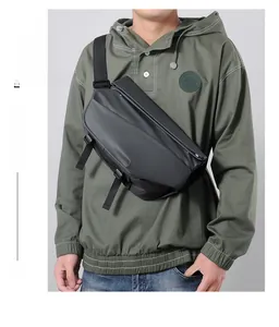 Detail of waterproof matte black crossbody bag with adjustable buckles for motorcycling
