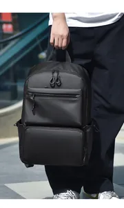 Close-up of minimalist black business backpack in high-density waterproof fabric material
