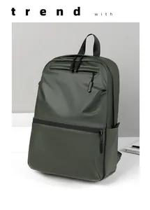 Detail showing matte waterproof olive green backpack with dual zipper and top handle