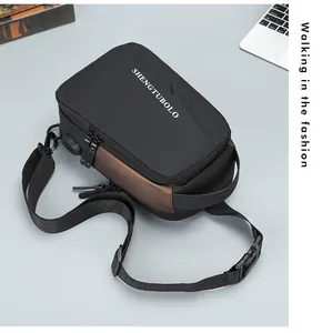 Detail of waterproof men's crossbody chest bag with external USB charging port