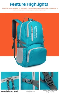 Detail of blue foldable travel backpack showing waterproof fabric and zipper structure