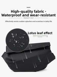 Detail view of the waterproof crossbody bag showing lotus-leaf hydrophobic fabric texture