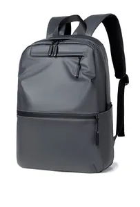 Detailed view of the gray waterproof backpack featuring multiple zipper pockets and top handle