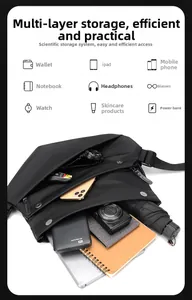 Detailed internal view showing large storage capacity for tablets and cameras in the bag