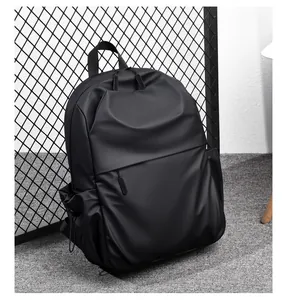Detail view of water-resistant black backpack with side pockets and pleated zipper design