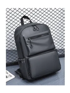 Detailed side view of water-resistant gray business backpack with U-shaped zipper pulls