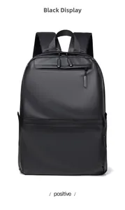 Front view of black minimalist business backpack featuring matte finish and multiple zippers
