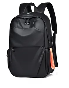 Detail of waterproof business backpack with USB charging port and orange strap