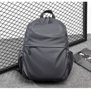 Close-up of waterproof dark gray backpack with high-density nylon and hidden zipper pockets